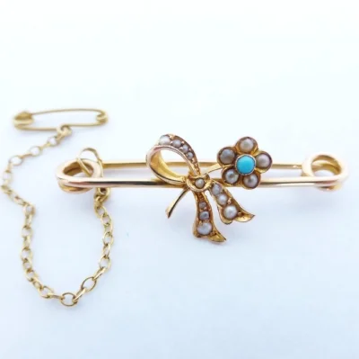 Brooches were secured with the additional use of a safety pin and chain. Associated with the mid and late Victorian era. 