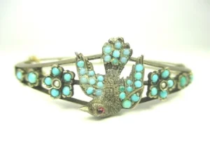 This late Victorian bracelet was made using a cast as well as being hand-set with stones. 