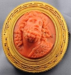 Fine Antique Coral Cameo Brooch within a Frame Accented By Greek Key Motifs And Applied Ropetwist Borders, With Pendant Hook, Mounted in Gold c.1801-1908 Prices4Antiques