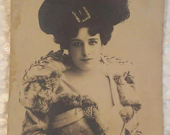Edwardian Lady appearing to have a buckle in her hair. 