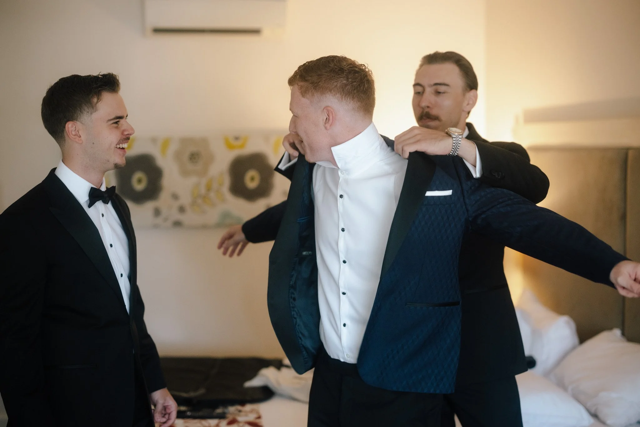 groomsmen-getting-ready-wedding-photographer.jpg