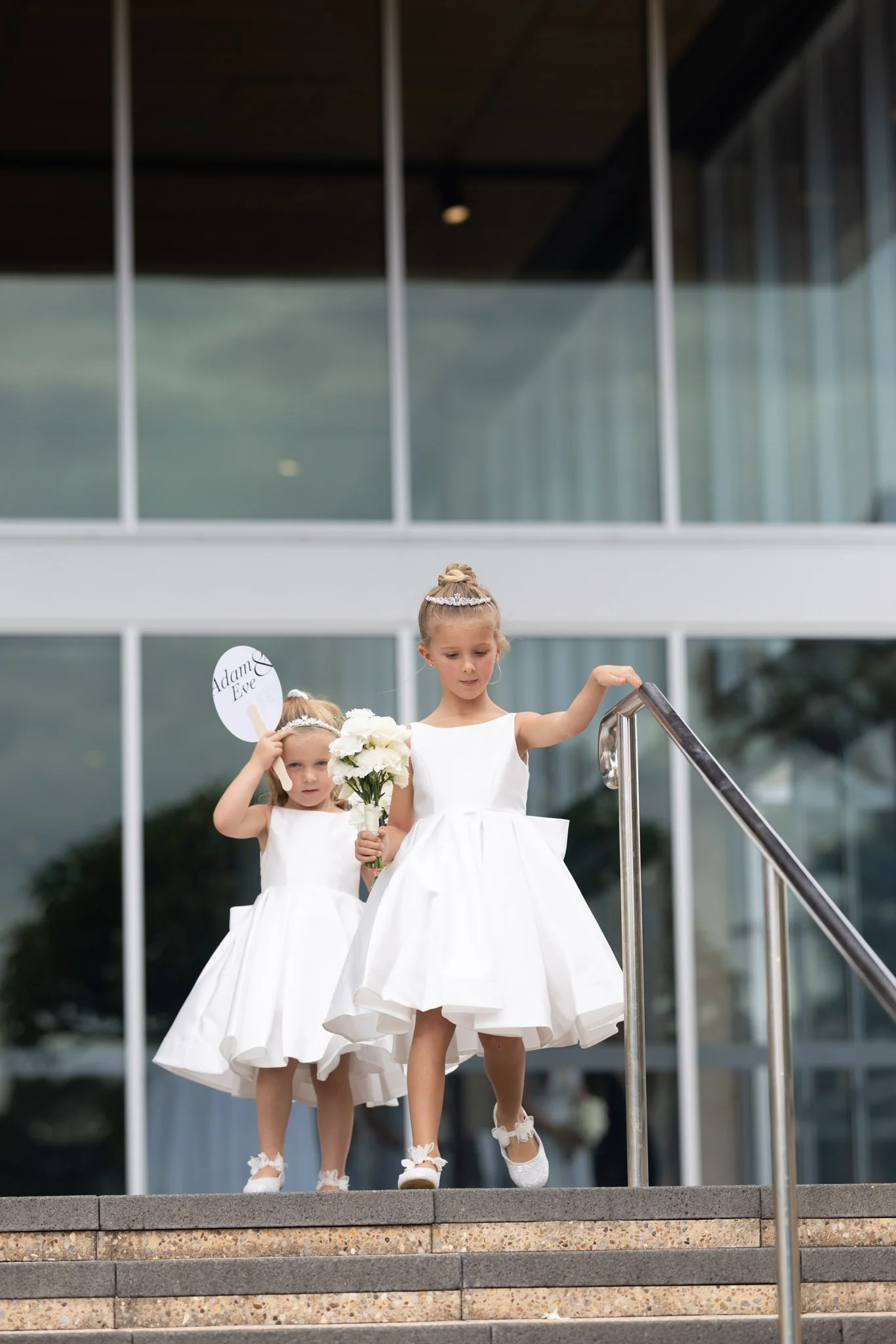 flower-girls-wedding-photographer-ceremony-stairs.jpg