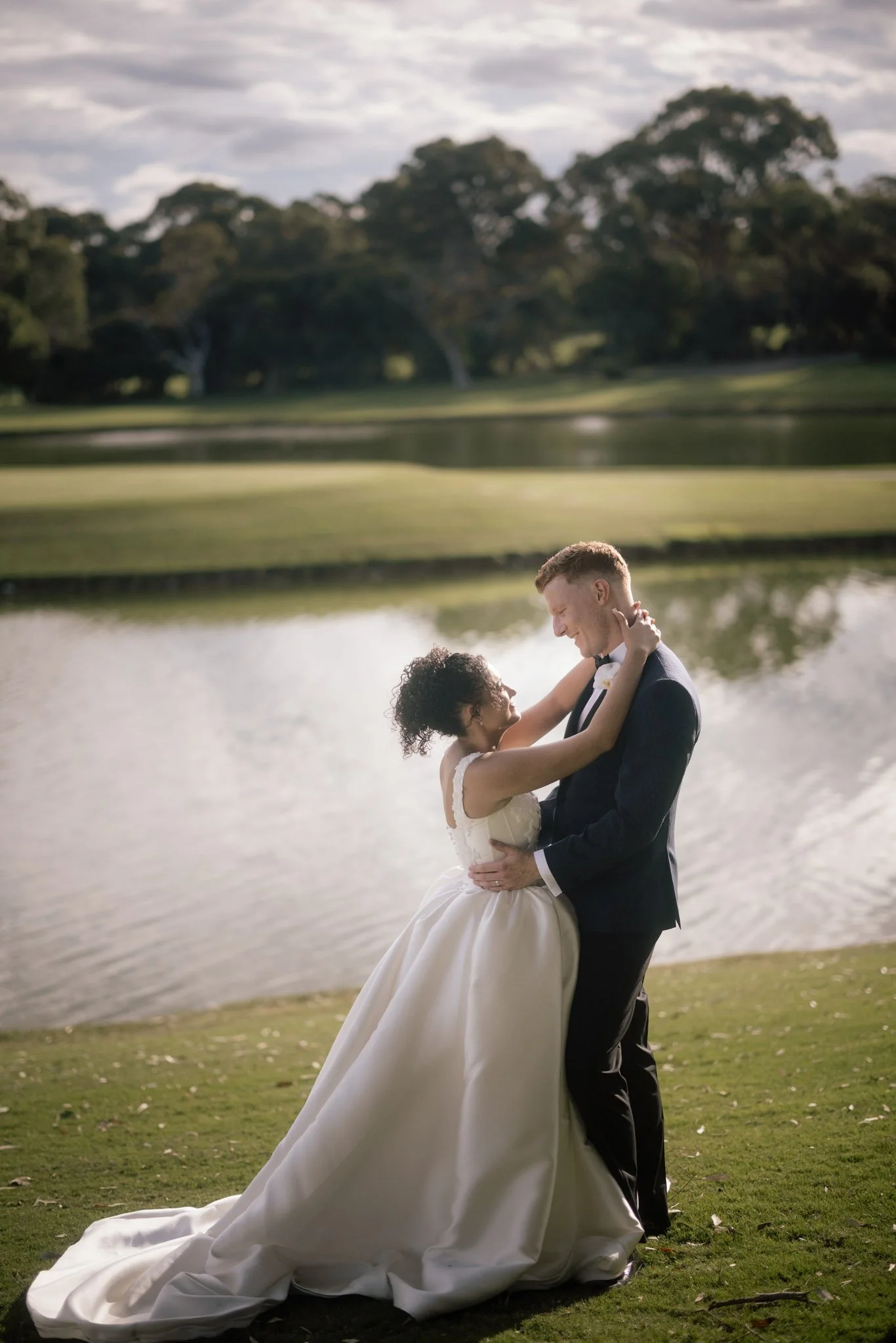 bride-groom-embrace-wedding-photographer-videographer.jpg