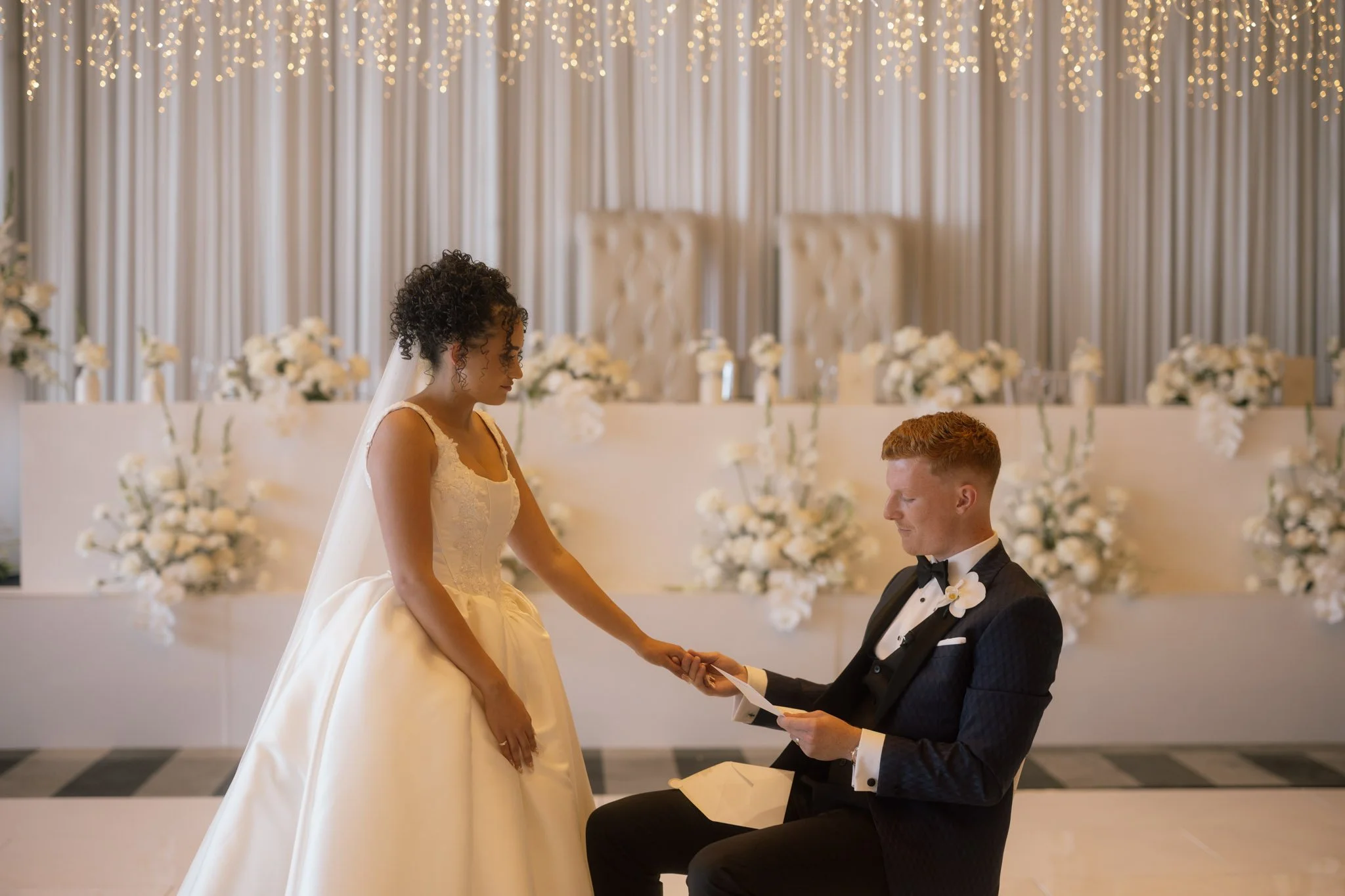 bride-groom-reading-vows-wedding-photographer.jpg