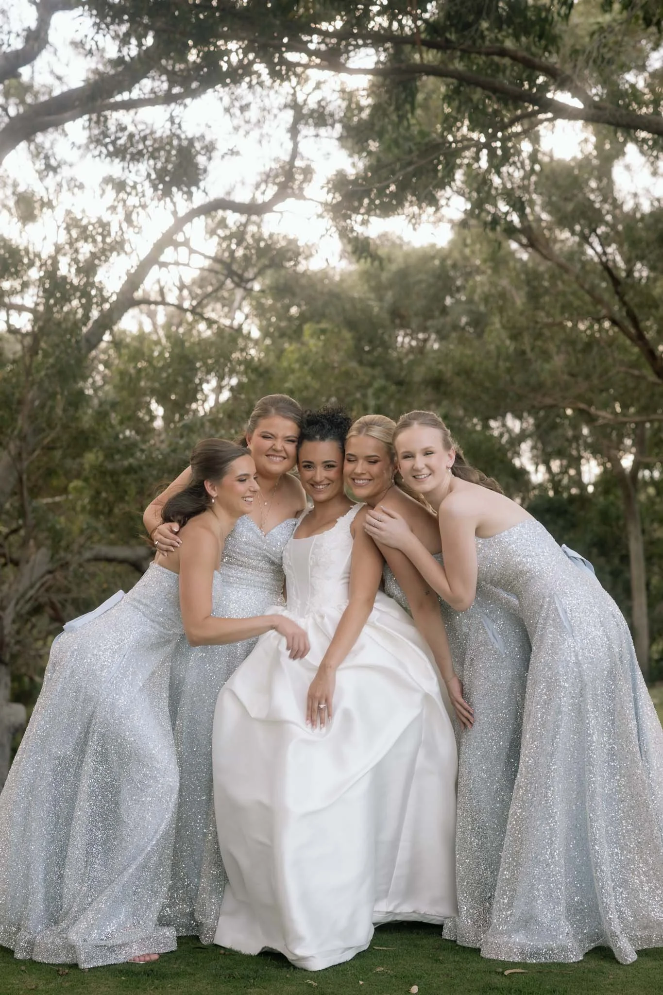bride-and-bridesmaids-wedding-photographer-outdoor.jpg