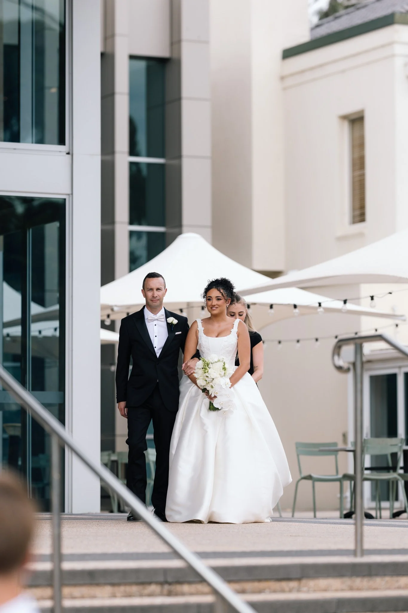 bride-groom-wedding-photographer-ceremony-entrance.jpg