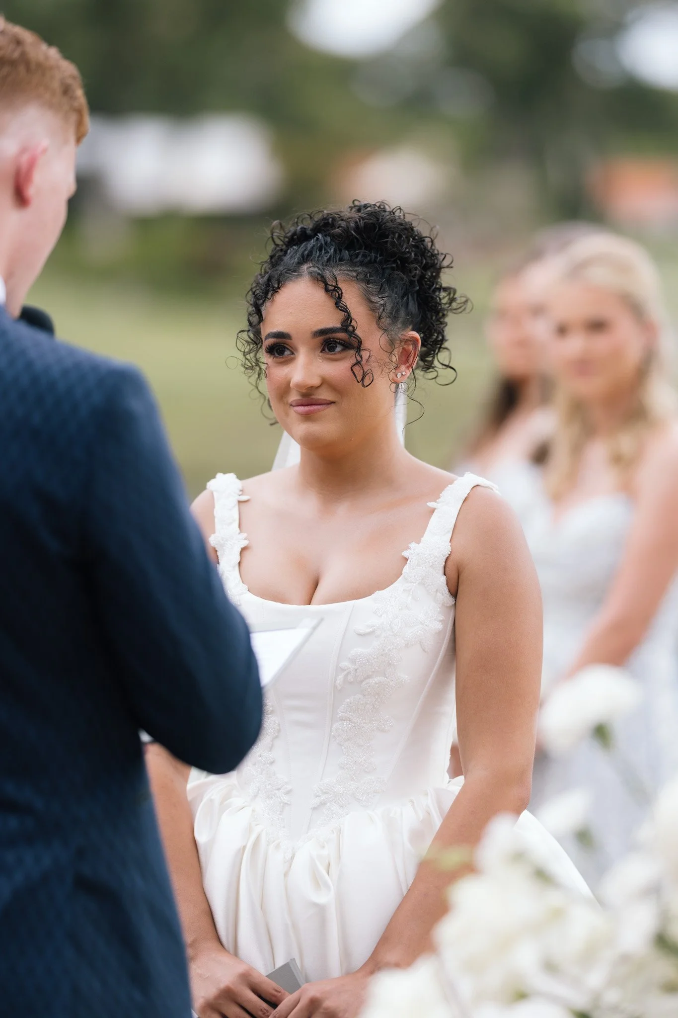bride-exchanging-vows-outdoor-wedding-photographer.jpg