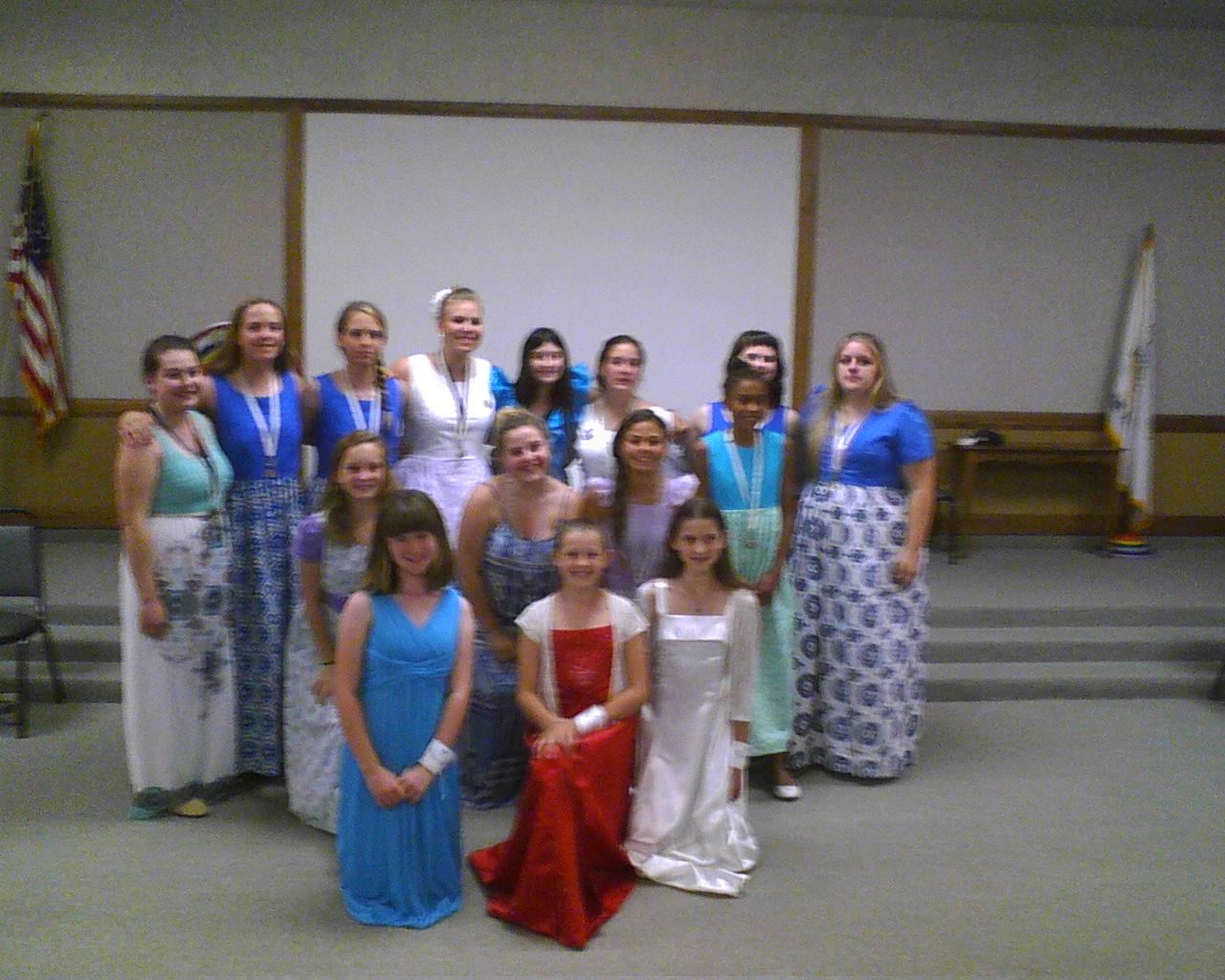 The three new initiates are in the front. This brings five new members to date, exceeding their recruitment target for the year.