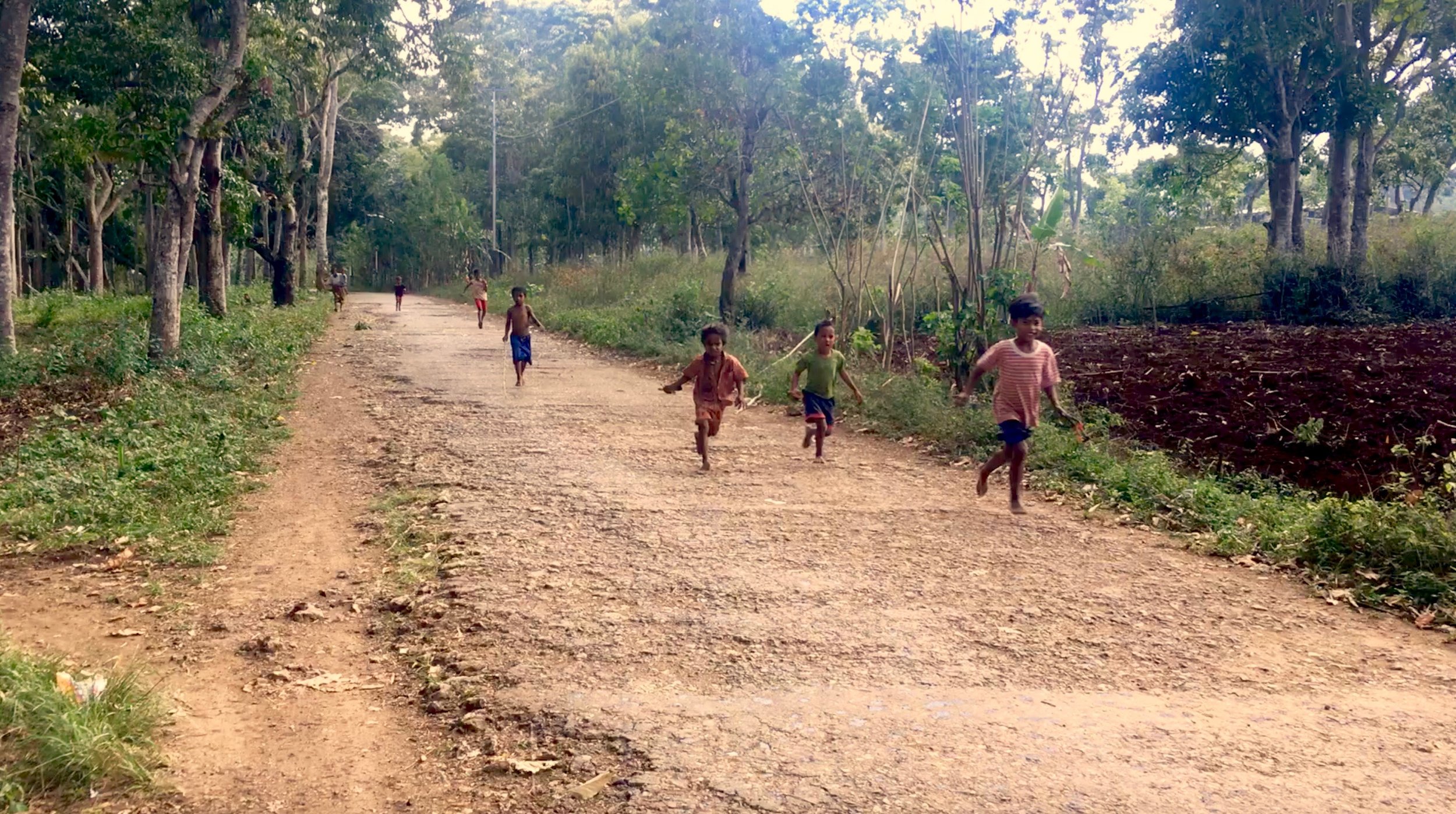 Young children in the village of Triloka, Timor-Leste photo by Davar Ardalan 