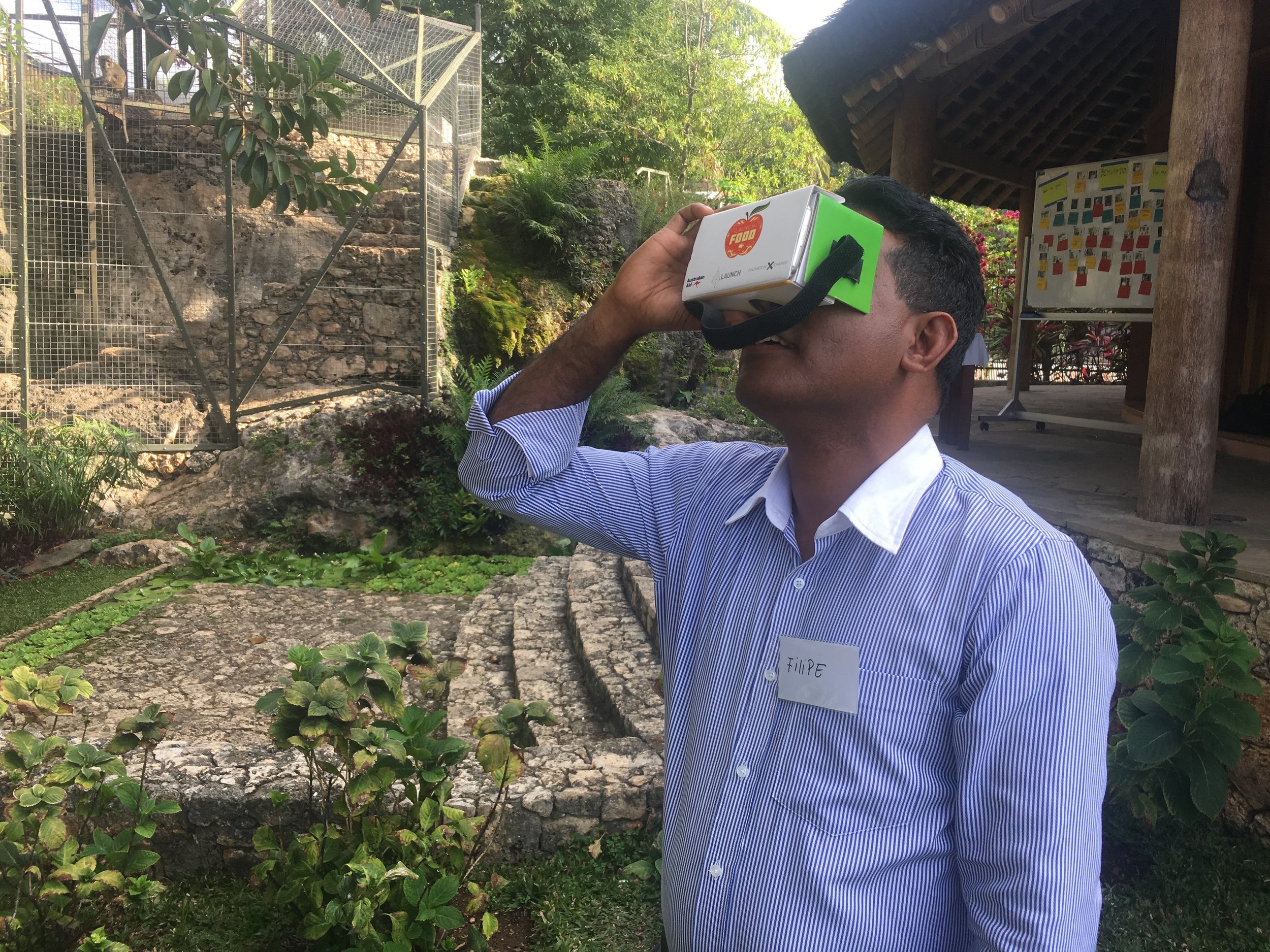 Presidential Advisor Sr. Filipe da Costa engaging in a VR experience in Baucau, Timor-Leste photo by Davar Ardalan 