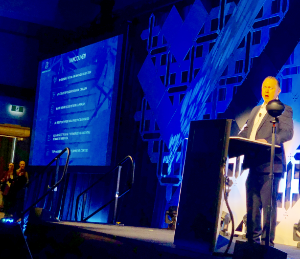 Nathan Pettyjohn welcomes the crowd at the VR/AR Global Summit in Vancouver, September 21, 2018