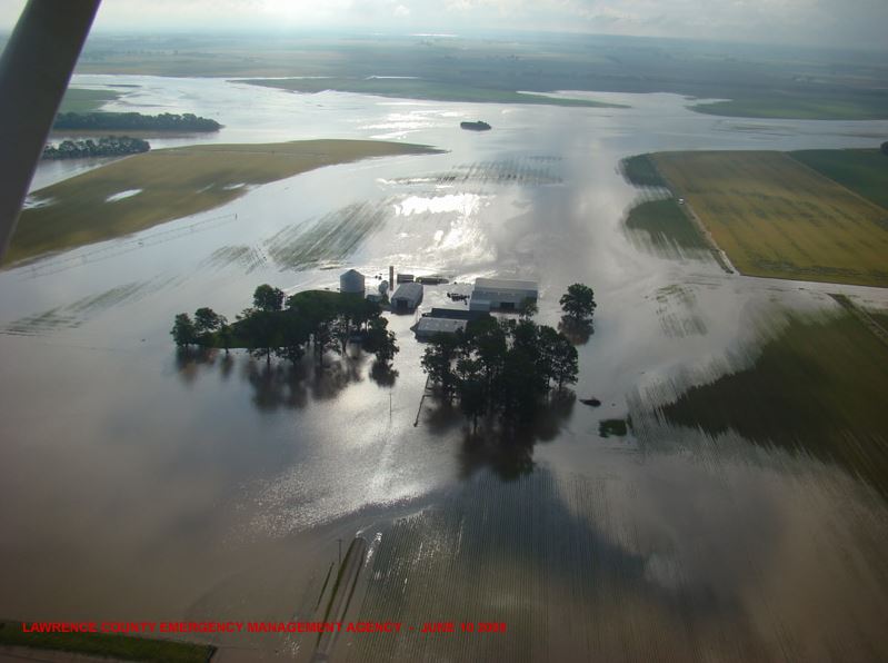 An Illinois farm swept by floodwaters.