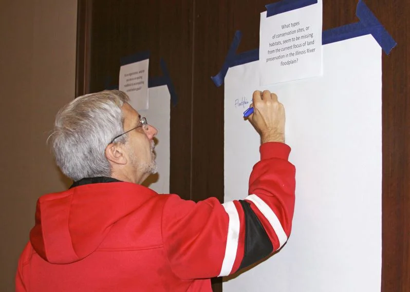 TWI Executive Director Paul Botts participates in brainstorming about the Illinois River system during the Watershed Partners Cafe.