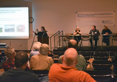 Jill Kostel, TWI senior environmental engineer, explains water quality trading at the March 2nd producer workshop.