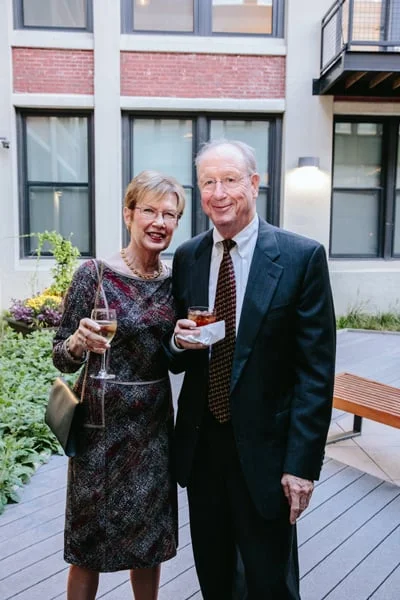 TWI Board Member Bill Dooley and his wife, Willie, enjoy cocktails in Greenhouse Loft's courtyard.