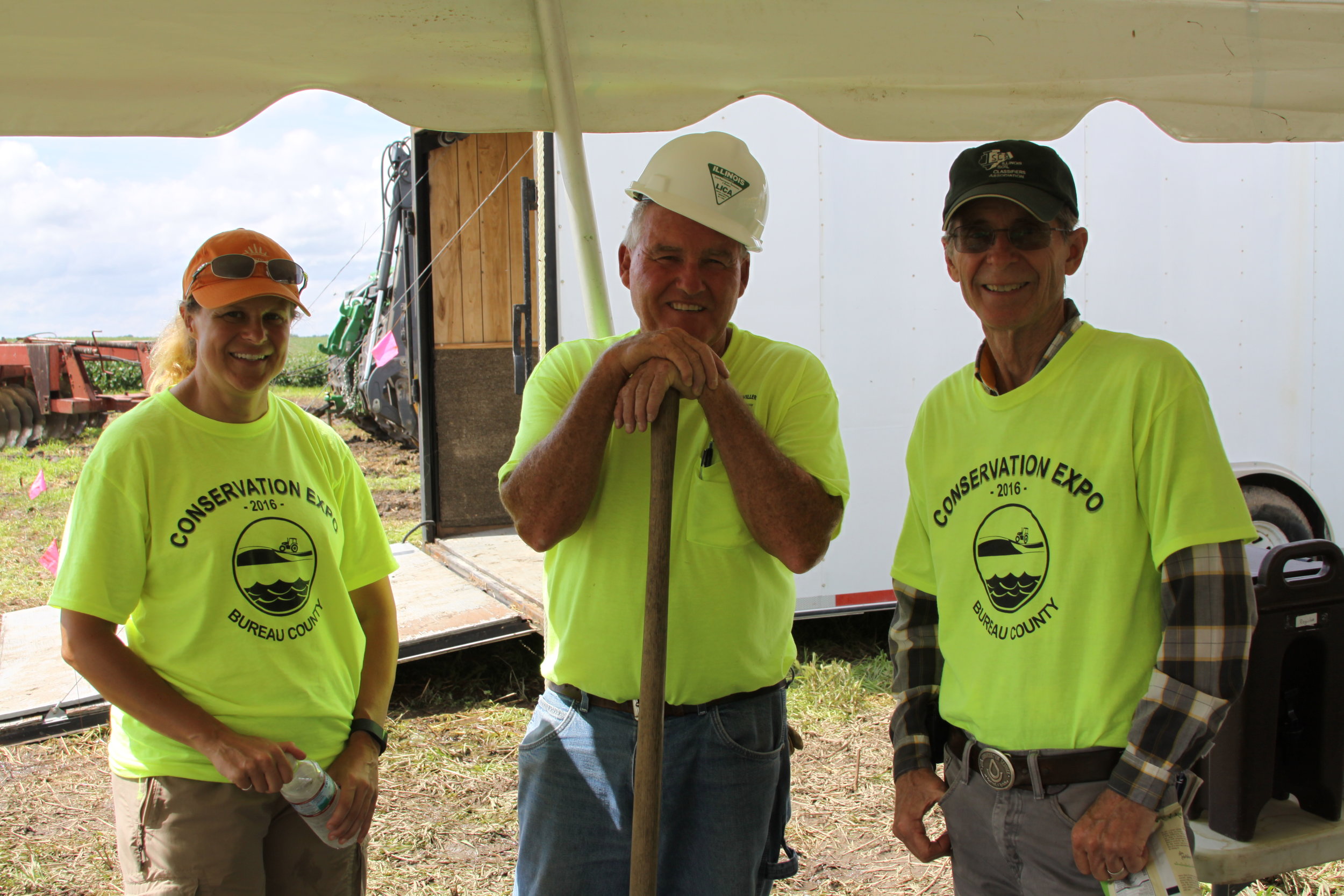 From left to right: TWI Senior Environmental Engineer Dr. Jill Kostel, ILICA contractor Wes Litwiller, and soil scientist Steve Zwicker during wetland construction on Bonucci Farms.