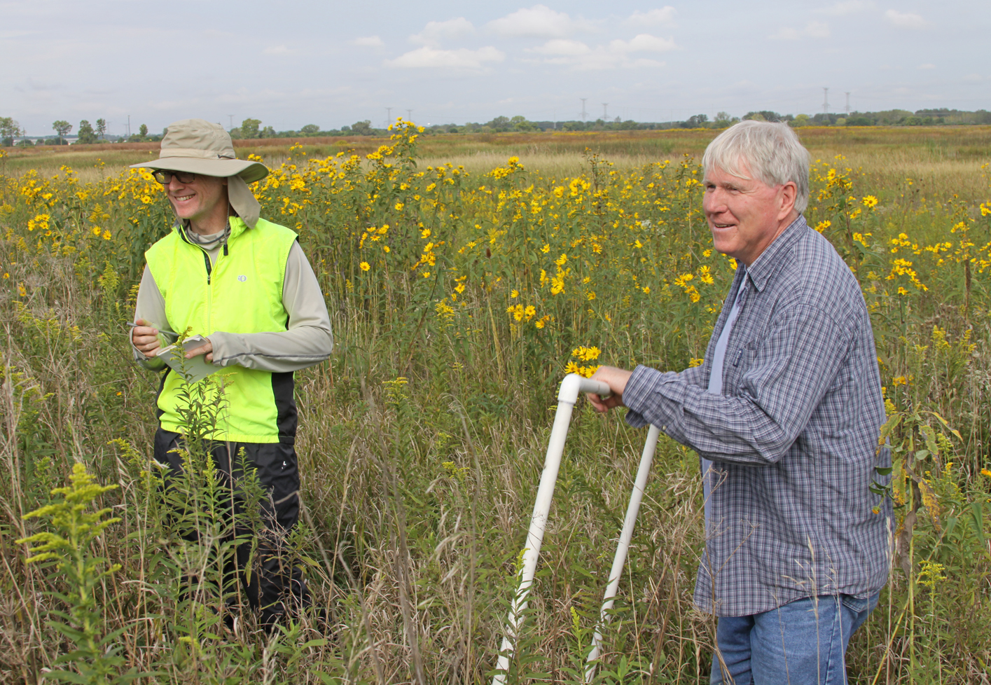 TWI Senior GIS Analyst Jim Monchak (left) and Senior Ecologist Dr. Gary Sullivan (right) collecting post-restoration monitoring data with a meter-square guide at Lobelia Meadows in summer 2016. Photo by Vera Leopold/TWI.