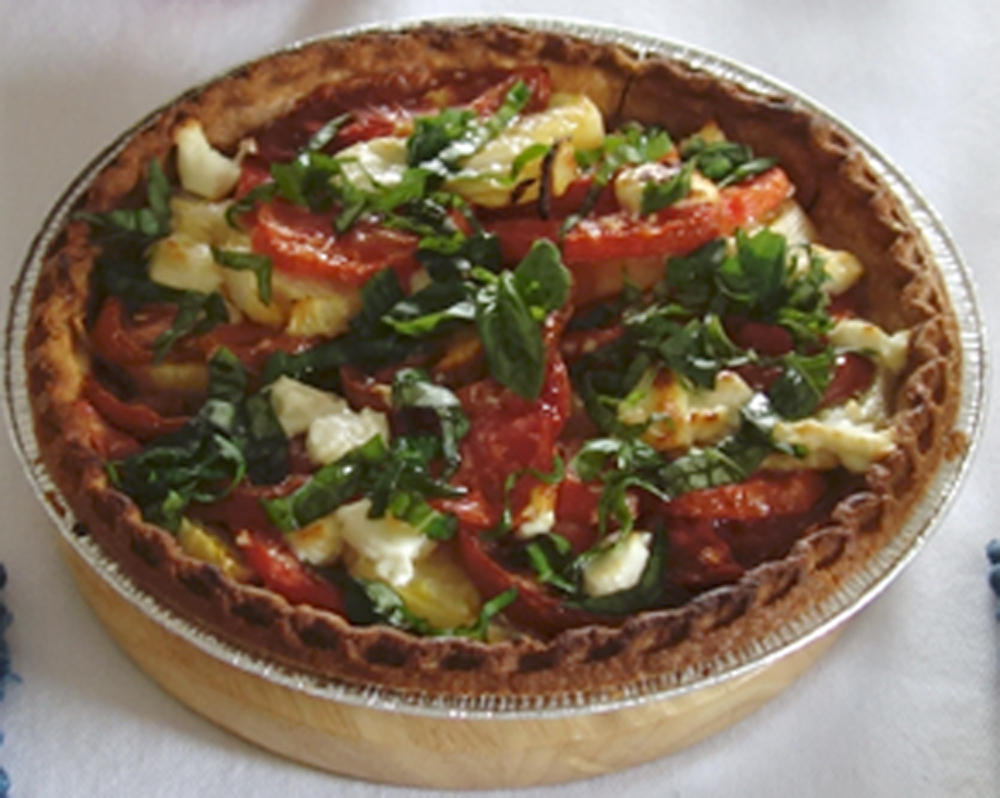 Warm and savory. The sweetness of the tomatoes balances the tang of the goat cheese.