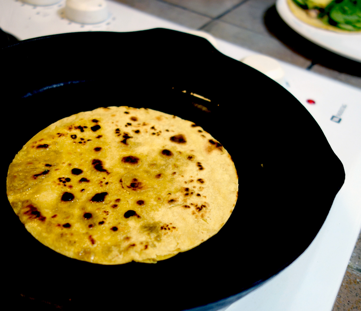 Corn tortillas grilled in a cast iron pan for maximum crispiness.