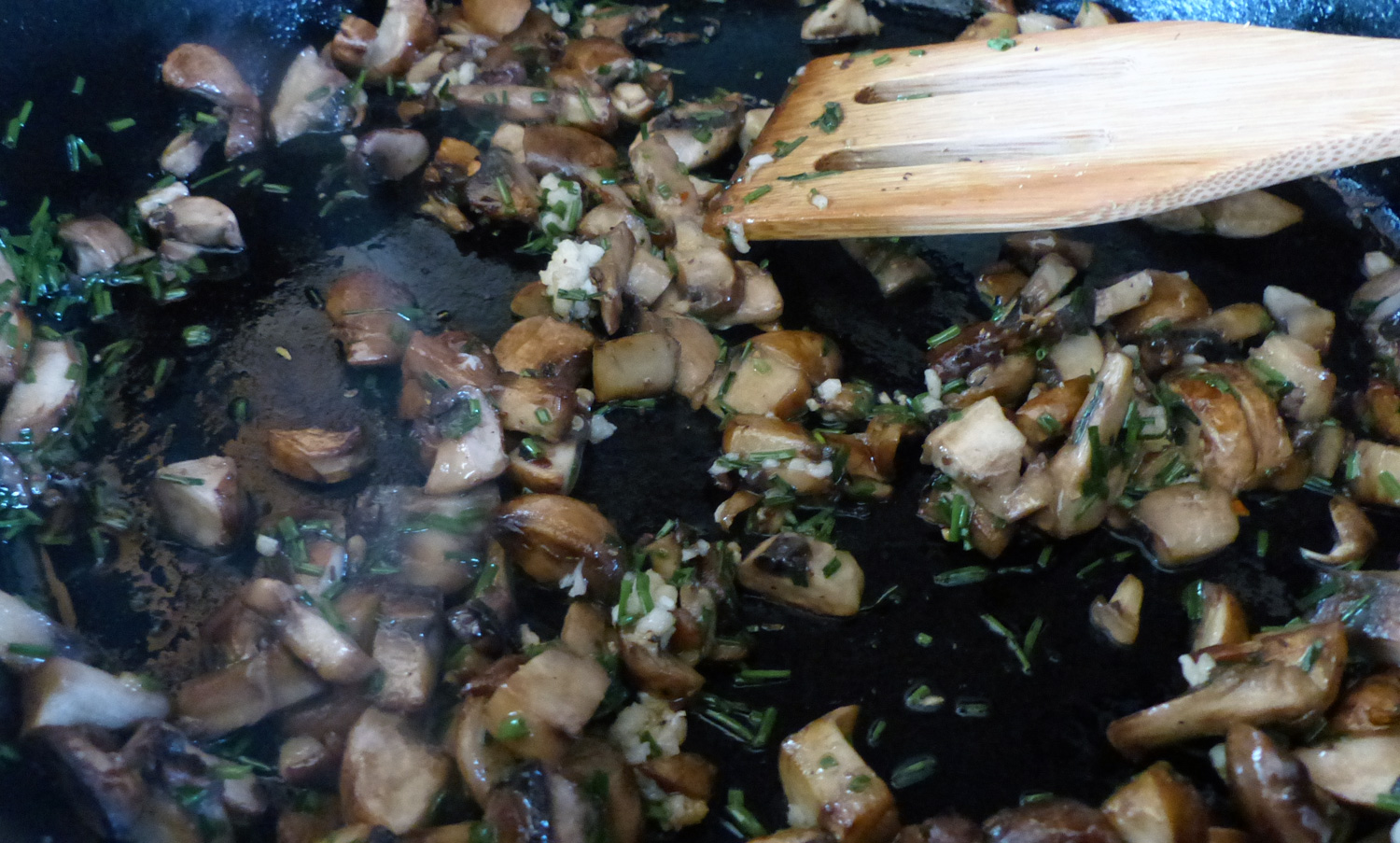 Nicely browned mushrooms with garlic and chives.