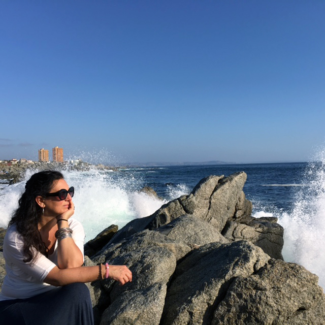 Thinking of all my fortunes perched on a rock overlooking the Pacific in Chile.