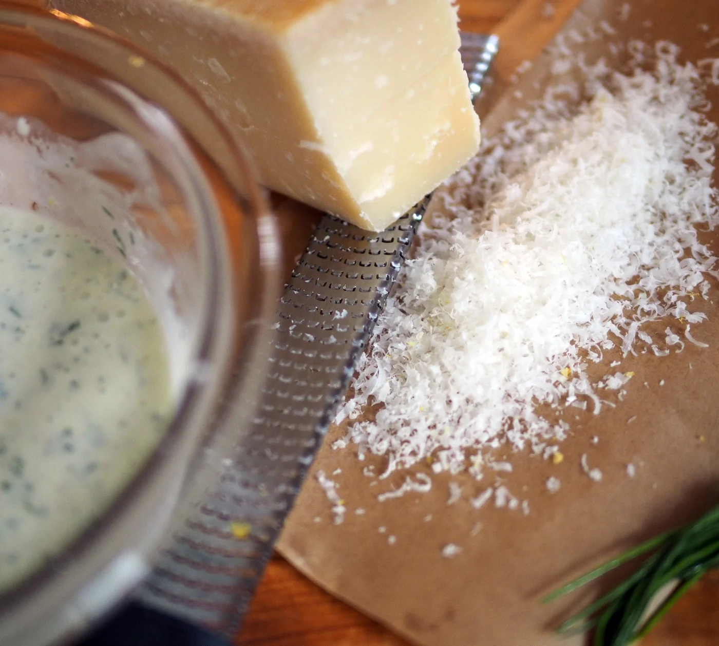 Don't forget to add the grated parm. This harkens back to the Caesar taste.