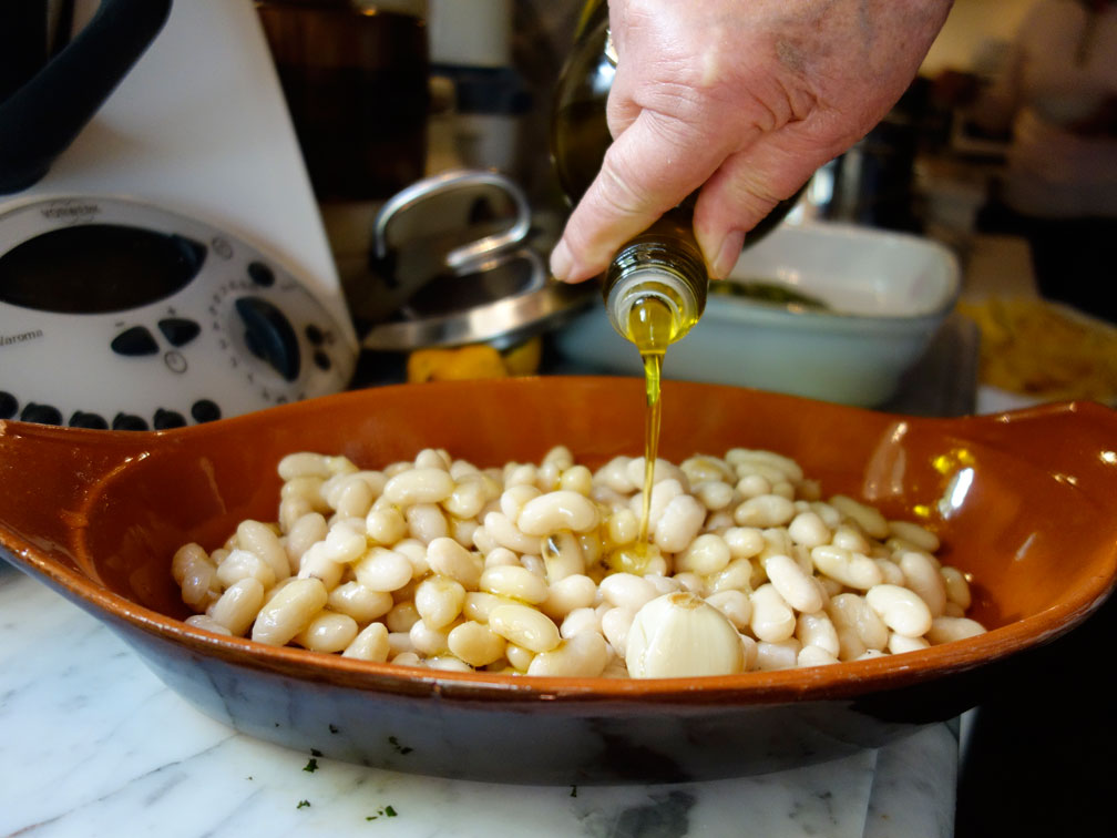 The simplest of dishes; cannelini beans dressed with garlic cloves and olive oil.