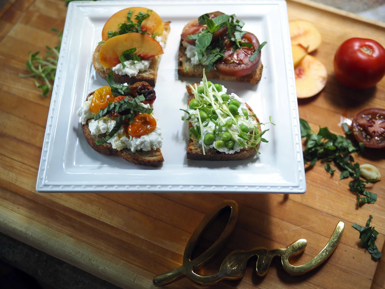 Ricotta crostini topped with the freshest, summer seasonal produce.