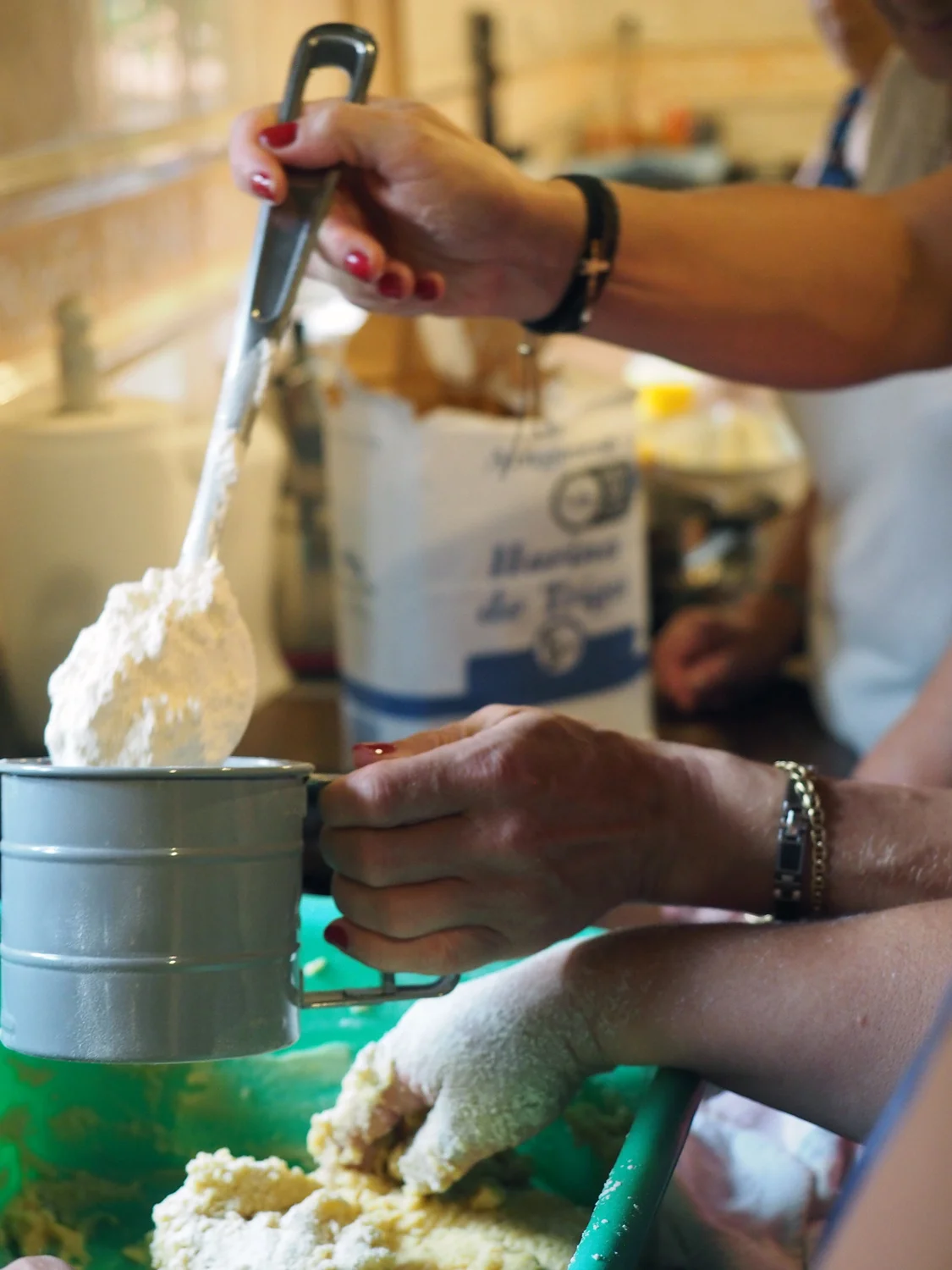 Sifting the flour.