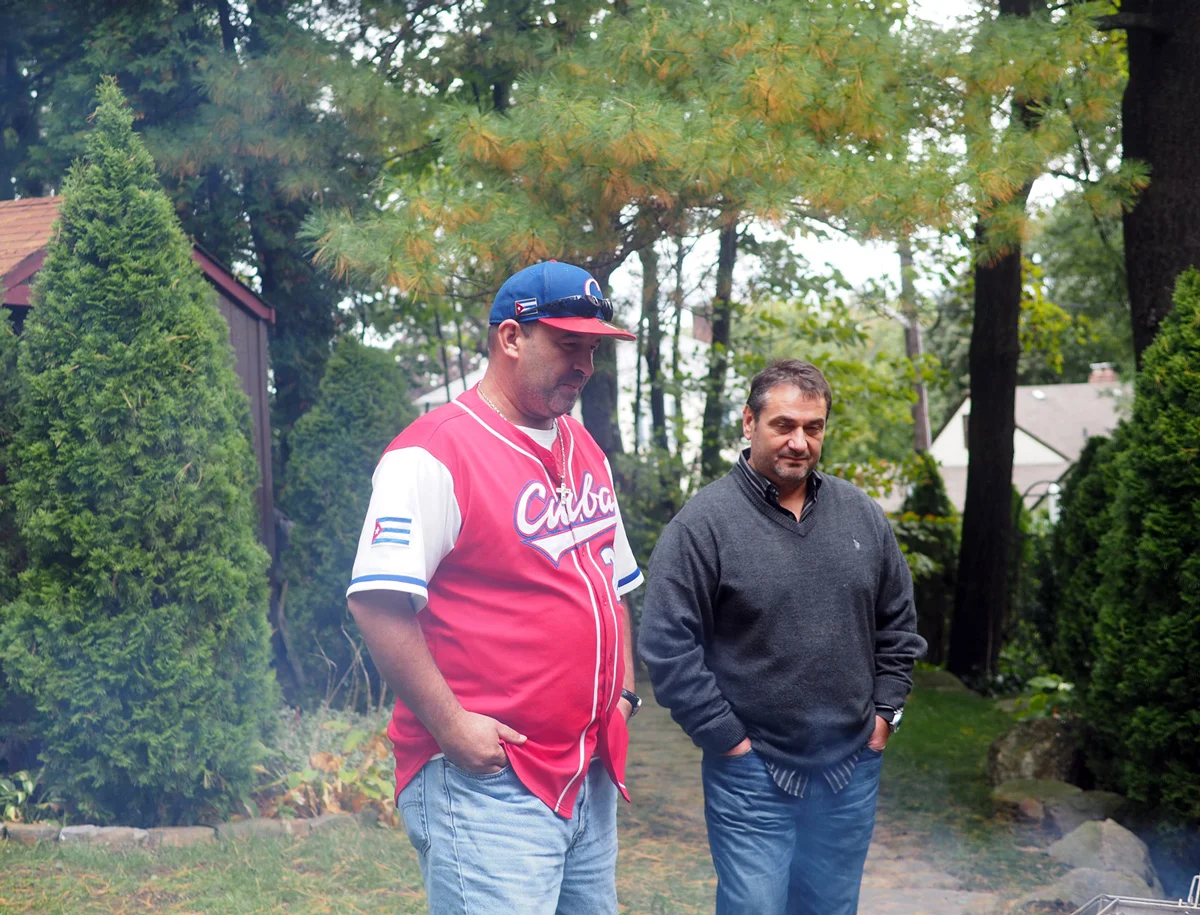 George contemplating fire with my brother in law Peter
