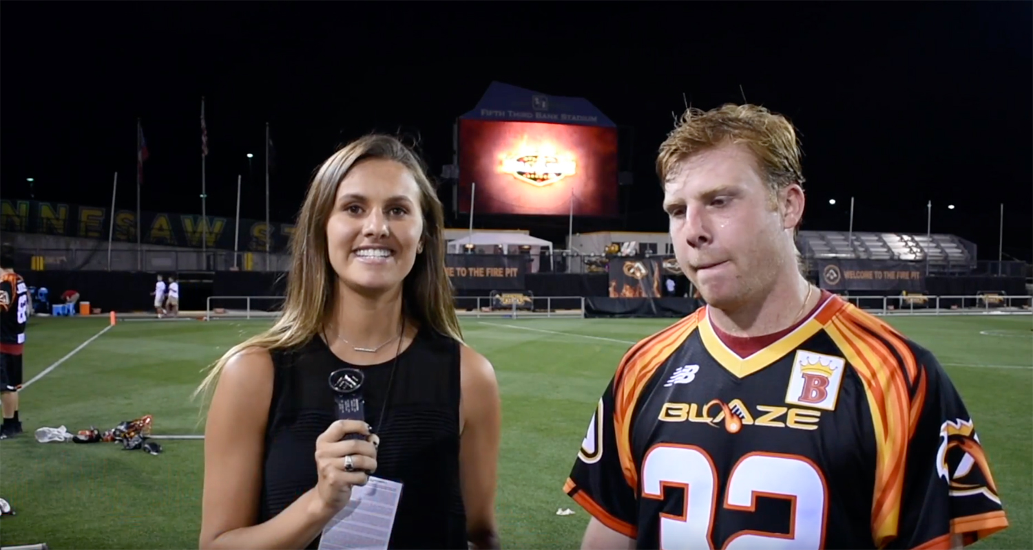 Michella interviewing the lacrosse MVP.