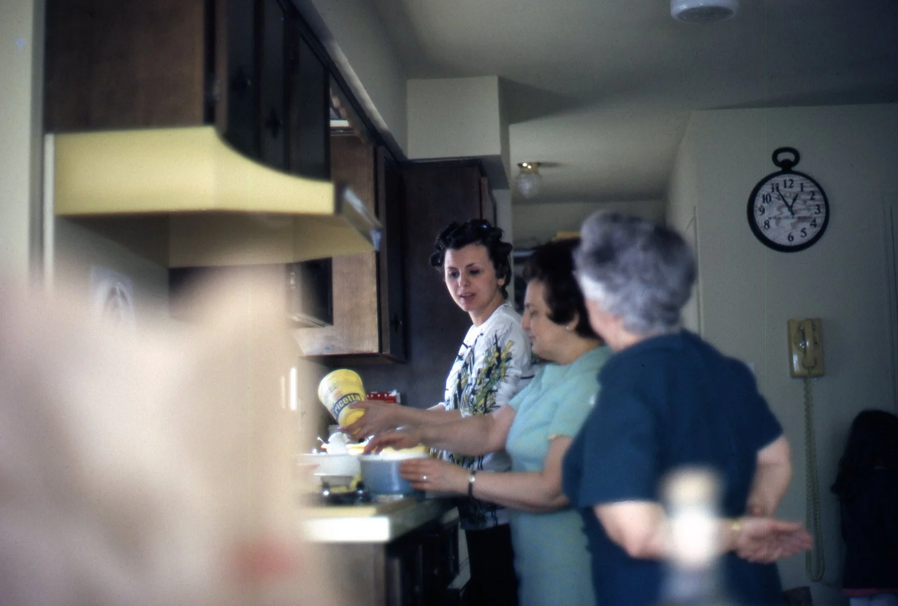 My mom and grandmothers prepping. It takes a village and a few generations to feed an Italian family! Photo credit: Paul Majewski