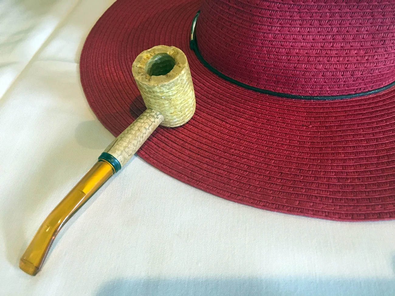 Aunt Catherine's favorite hat and her corn cob pipe. No button nose here.
