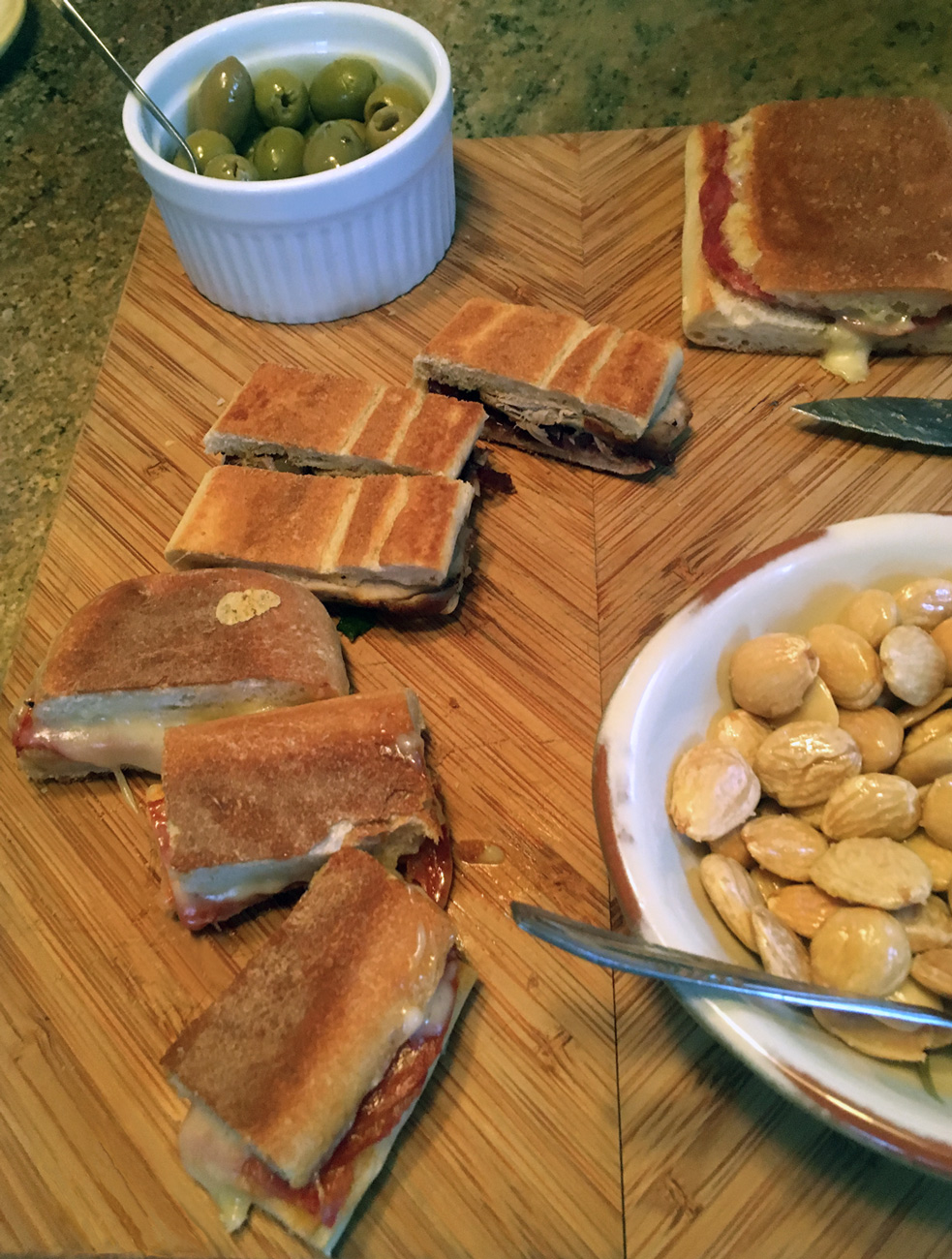 A panini press gives a nice warm crispness to the bread and melts the cheese.