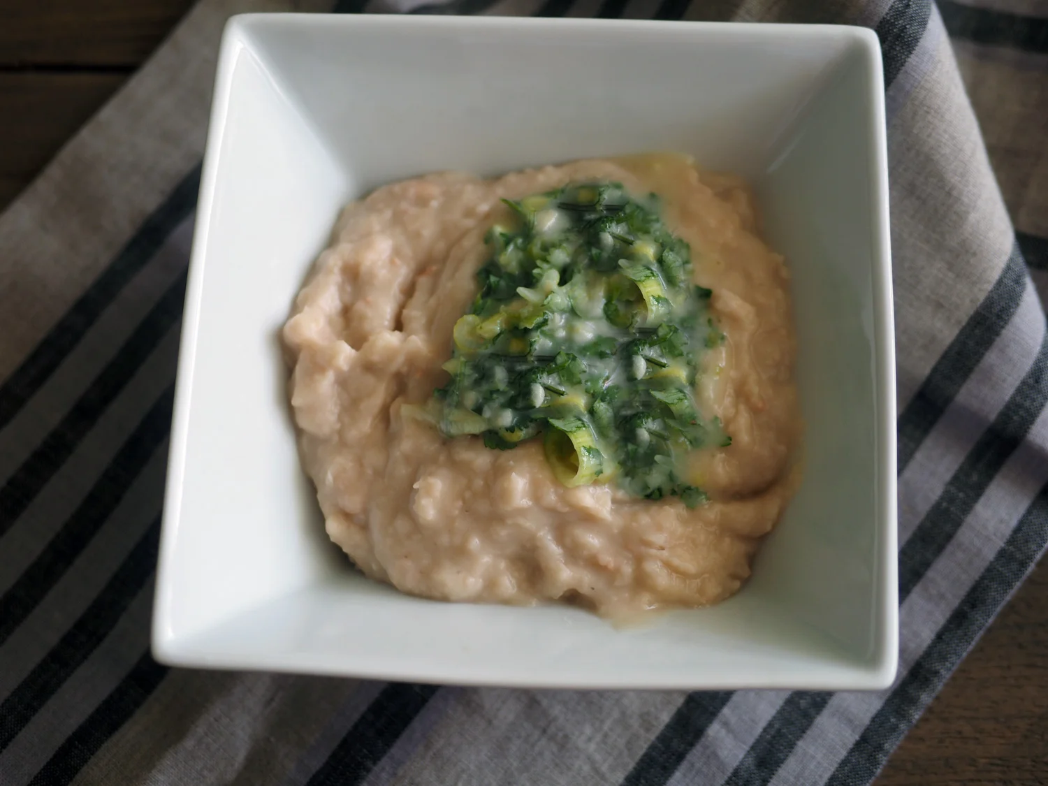 Dollop the scallion, cilantro mixture on top.