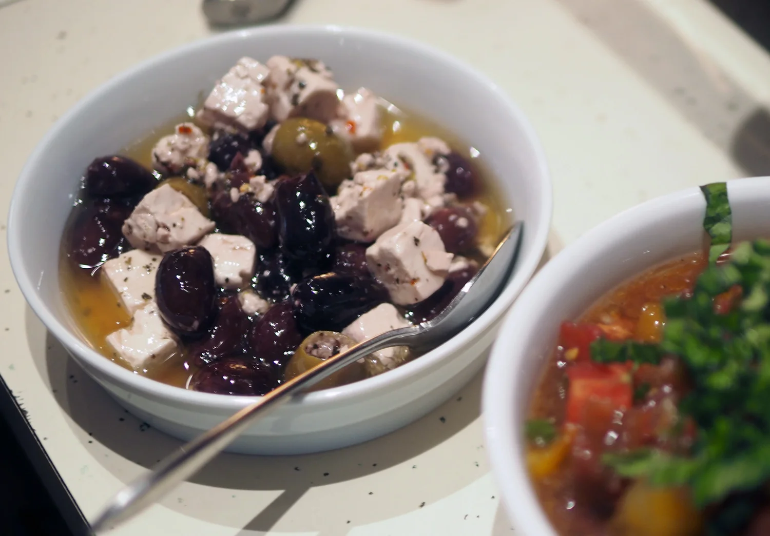 You don't always have to make all the dishes. Sometimes buying really good prepared foods is just the right answer. Marinated olives & feta.
