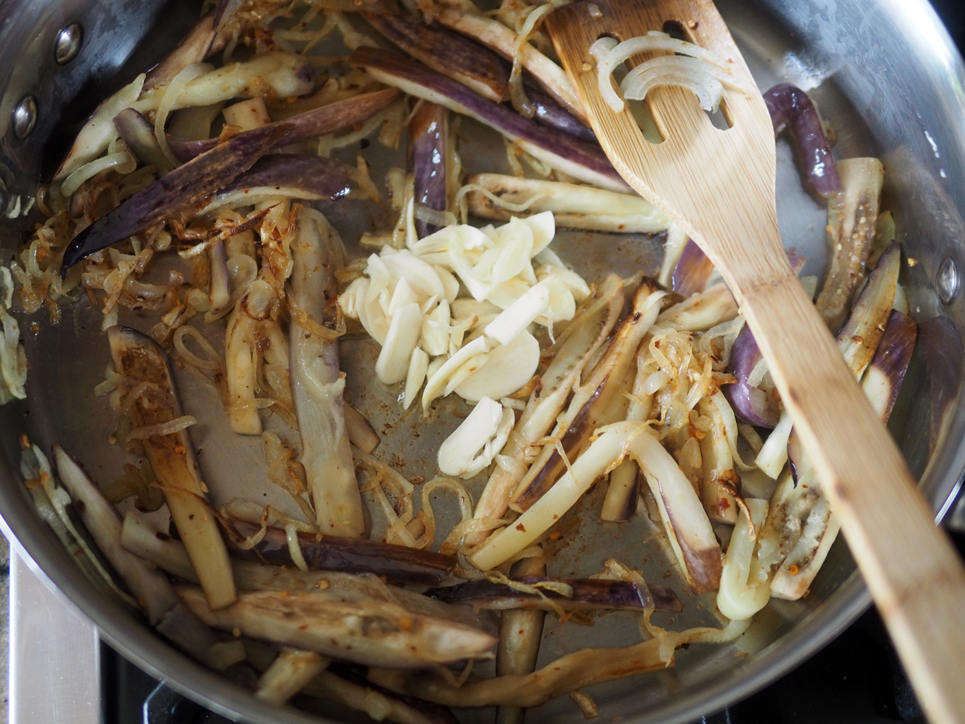 It's important to not overcook the garlic, so only add that once the onions and eggplant are browned.