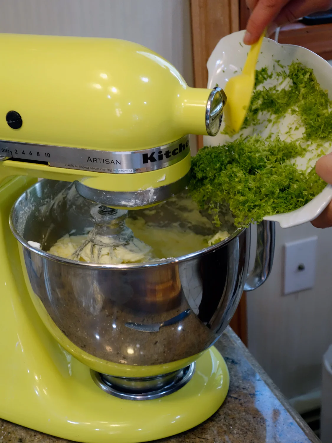 When you add the lime juice and zest the butter seems to break, but do not worry. It all comes together with the dry ingredients. Photo credit: asithappens.format.com