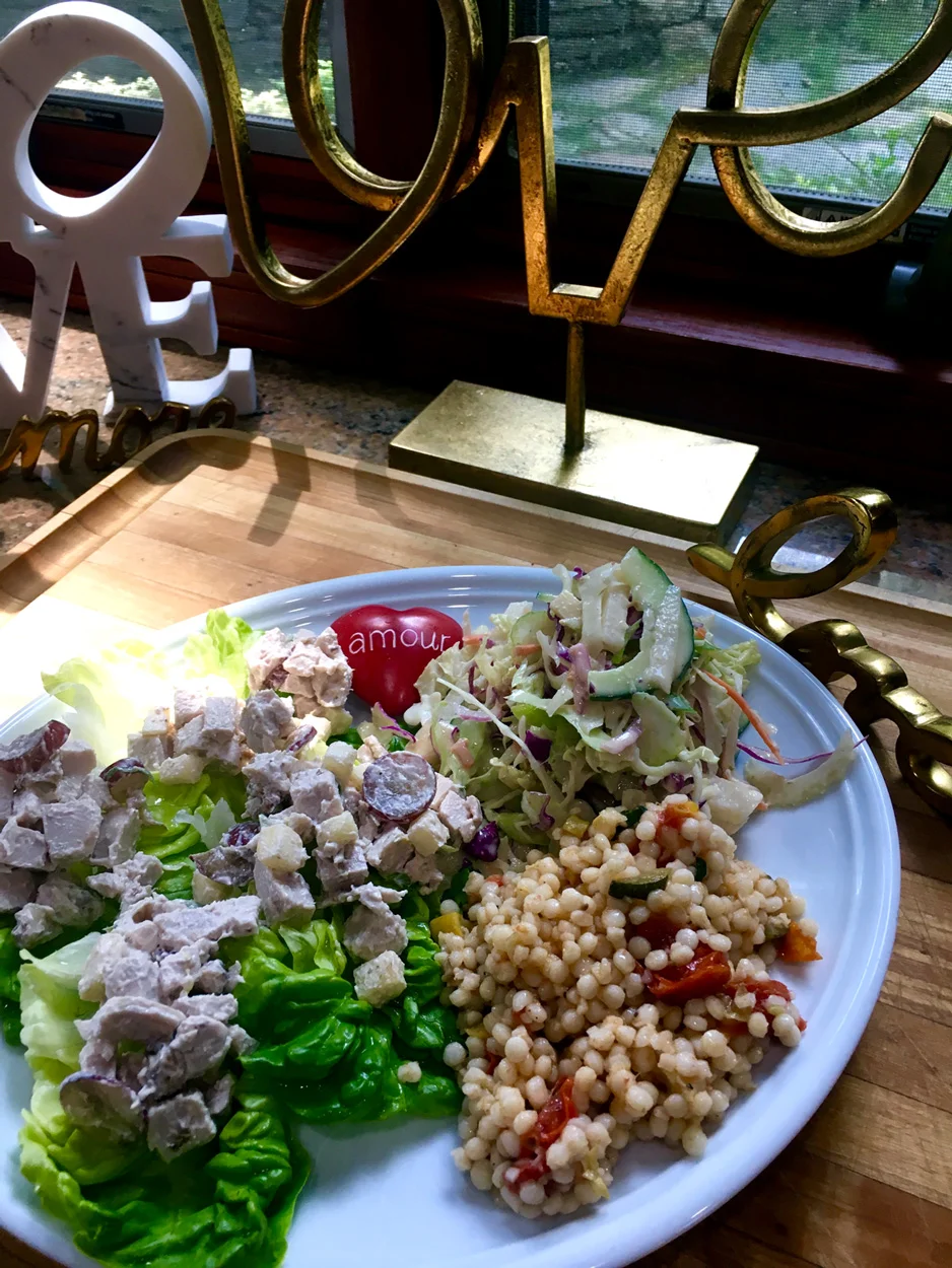 My plate full of love that I made for JC's lunch. Boston lettuce pockets filled with zingy chicken salad, couscous and peanut slaw.