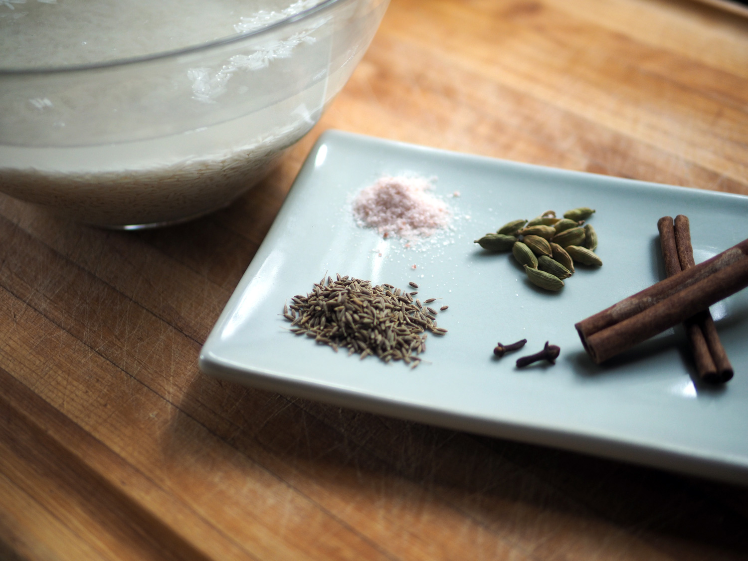 Mise en place, get everything ready and in place. Salt, cardamon seeds, cinnamon sticks, cloves, cumin seeds.