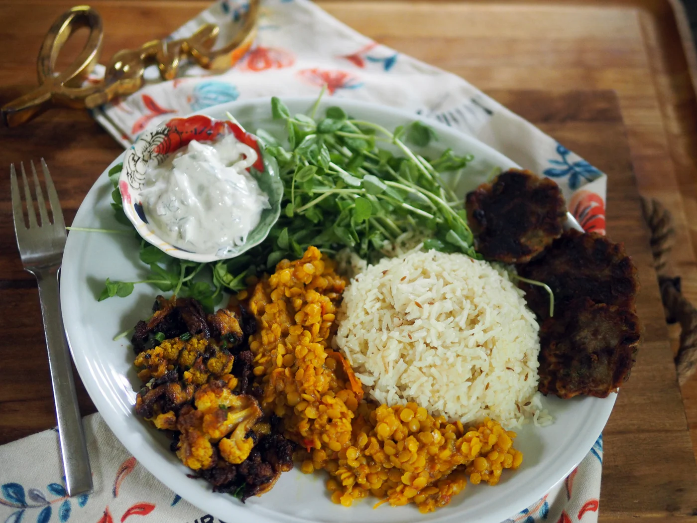I served it with the Indian Spiced Rice, Spiced Cauliflower, Potato Pancakes and raita.