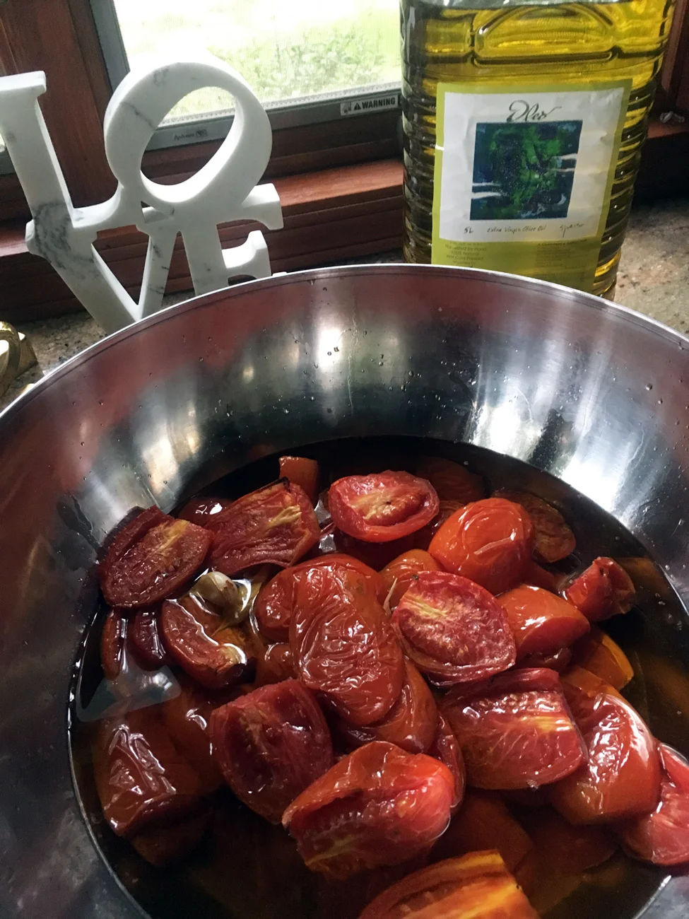 The tomatoes come out tender with concentration flavor. Sweet like candy but with a savory richness that enhances any dish. These are the oil roasted ones. I used oven dried for this spread recipe. No oil is used when oven drying tomatoes. But as you can see, the oil roasting method uses a ton of oil. I use Oleo, a Spanish Olive Oil from Spain. You can buy it at Despaña .