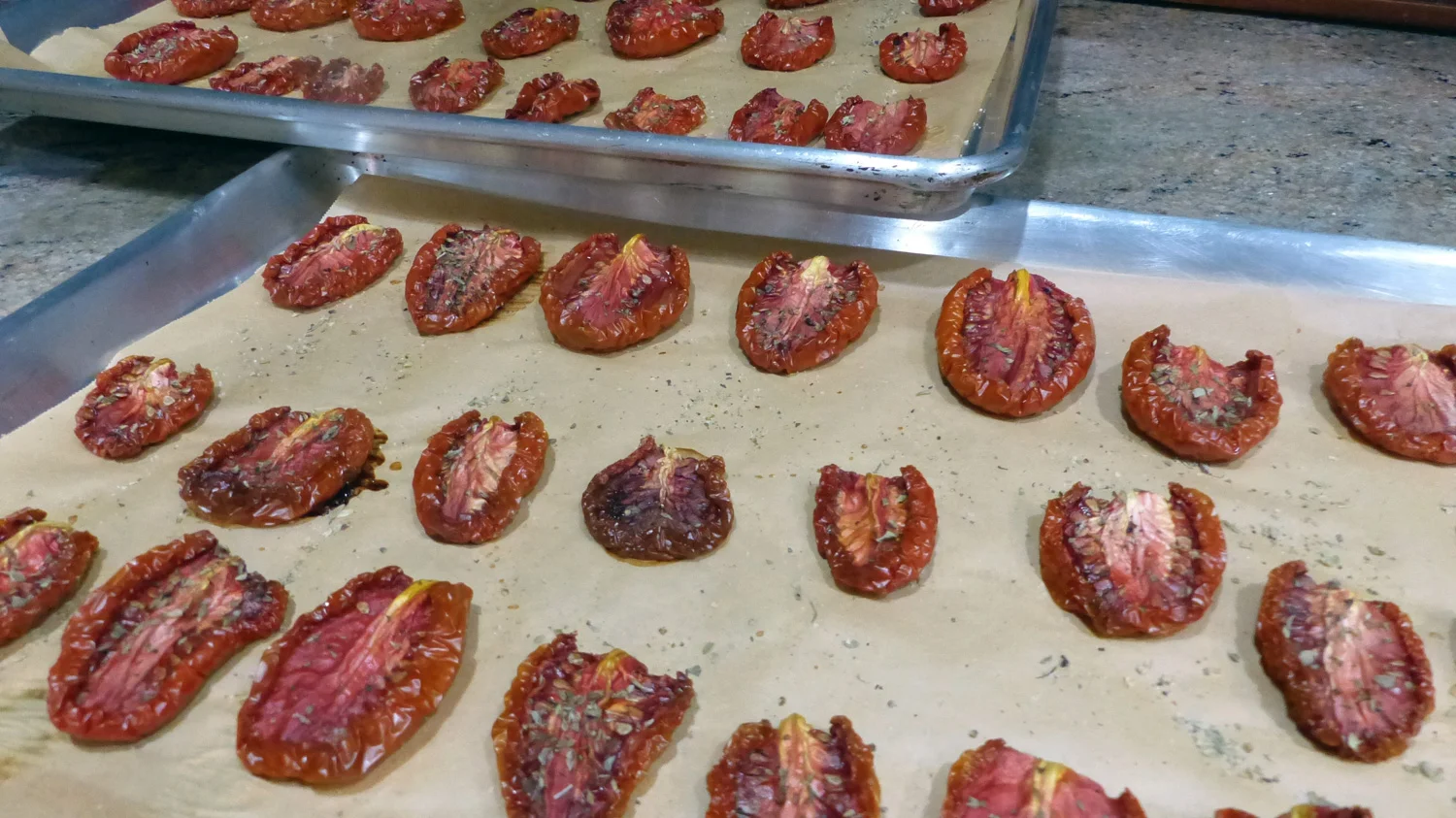 This is the way to oven dry the tomatoes. No oil is added, as you want them to dry out slowly in a low temp oven for 8-10 hours. Recipe here