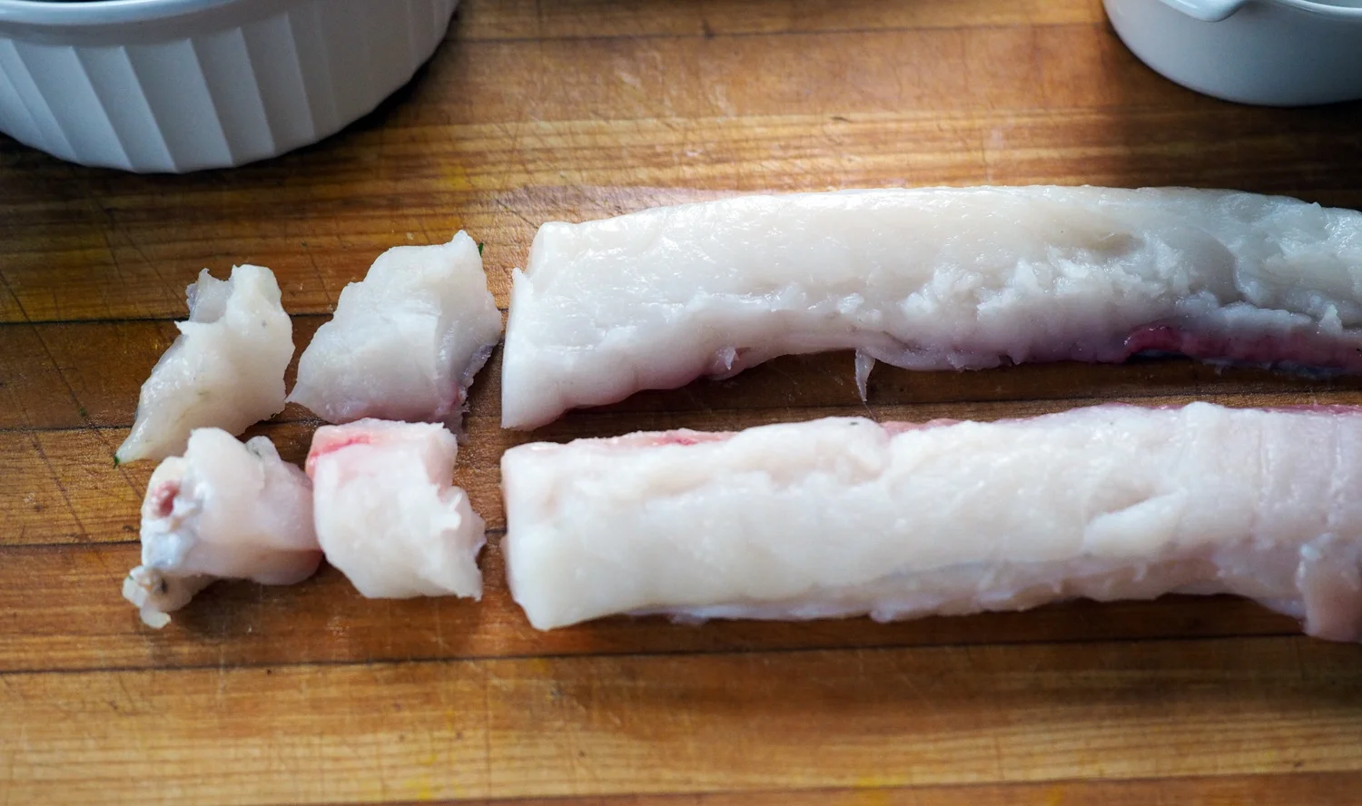 Monkfish comes in a long strip. I cut in down the middle, then cut small 1” cubes.