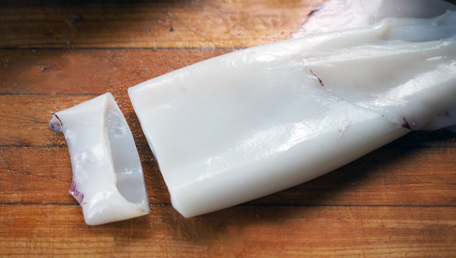 No one should have to take the time to clean squid. Buy it cleaned. Just make sure the inner cartilage is removed. Then slice ringlets.