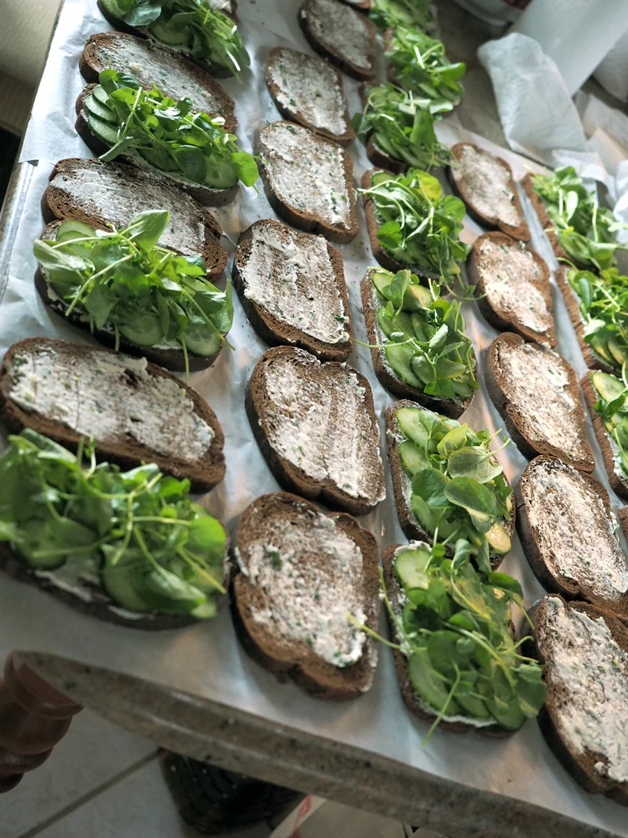 I needed plenty of finger sandwiches for my event. Assembly line work is in my blood and makes the task go faster.