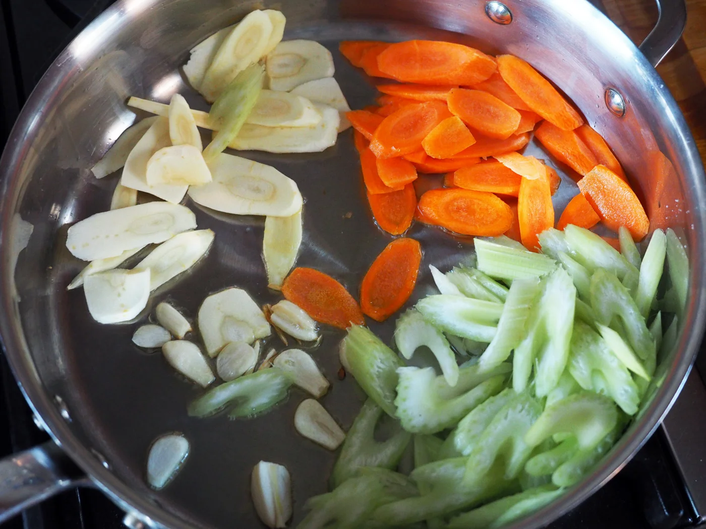 First cook down the heartier vegetables just until they are soft.