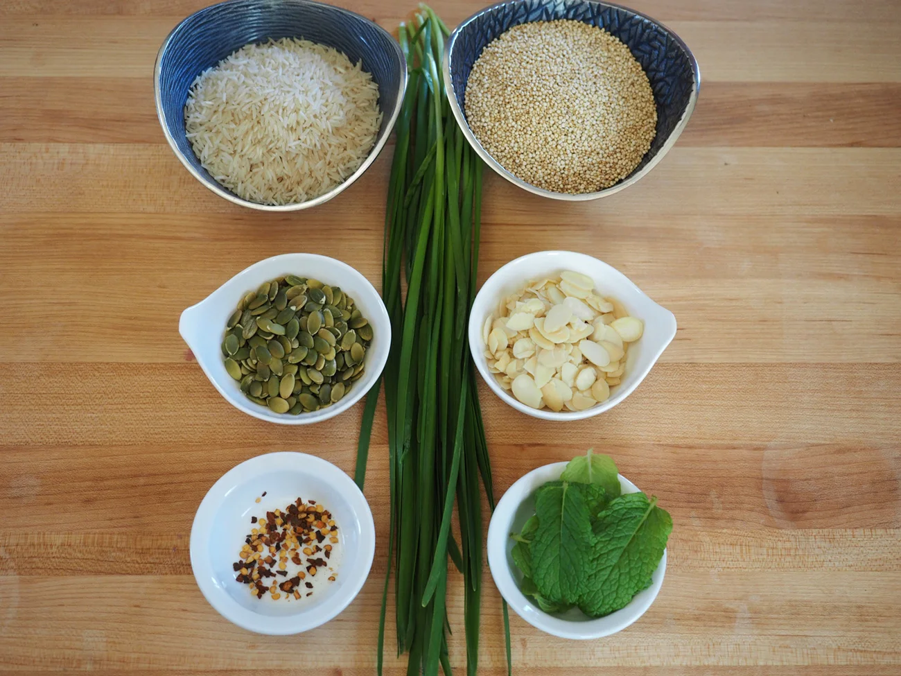 The main line up: Basmati Rice, Quinoa, Pepitas, Slivered Almonds, Fresh MInt, Red Pepper Flakes and Chinese Chives.