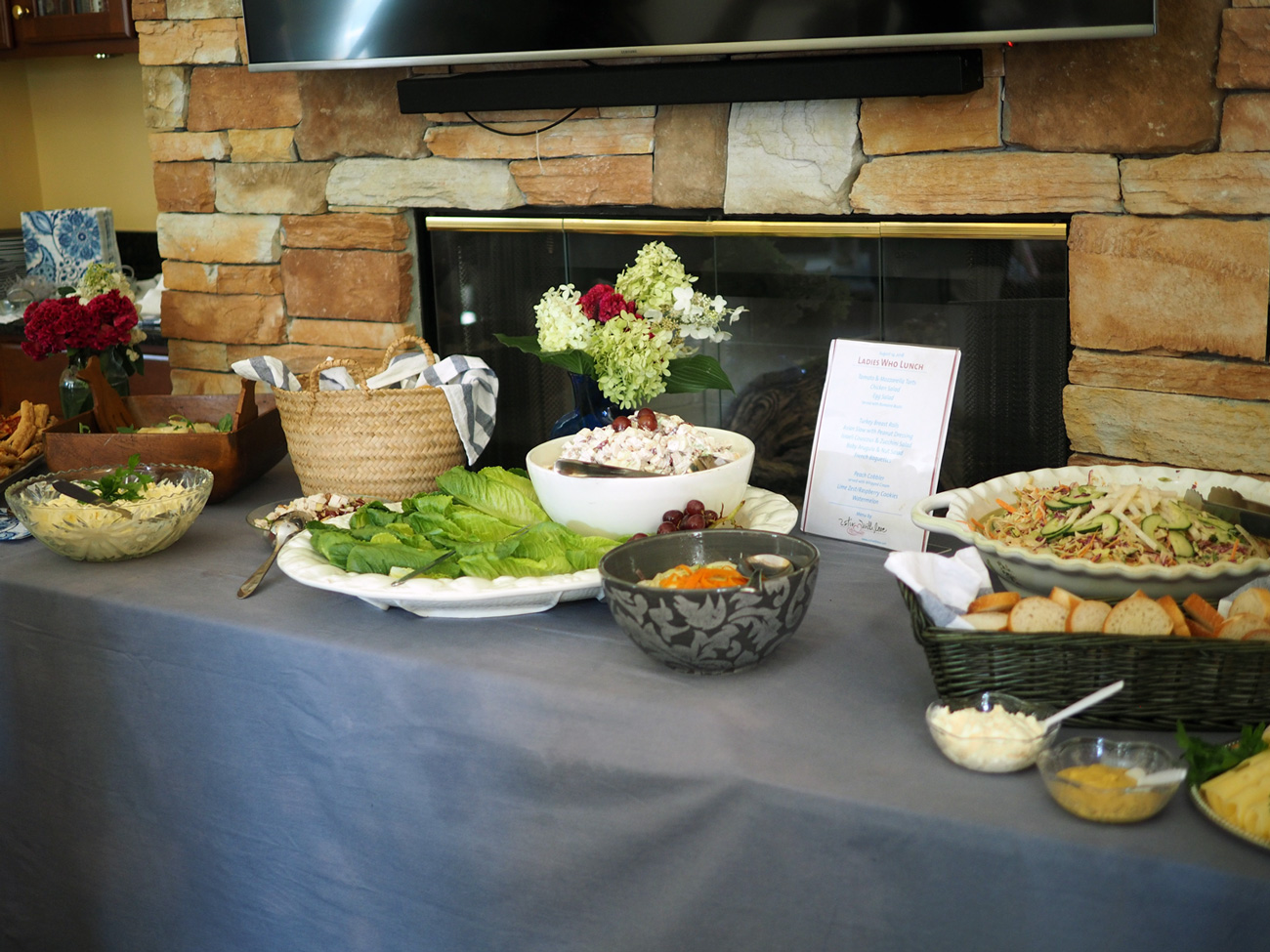 I was happy that they allowed me to move around furniture so we could set up the buffet table for maximum access. I placed a menu on the table with all the offerings. You can also place cards in front of each dish as a way to identify the food.
