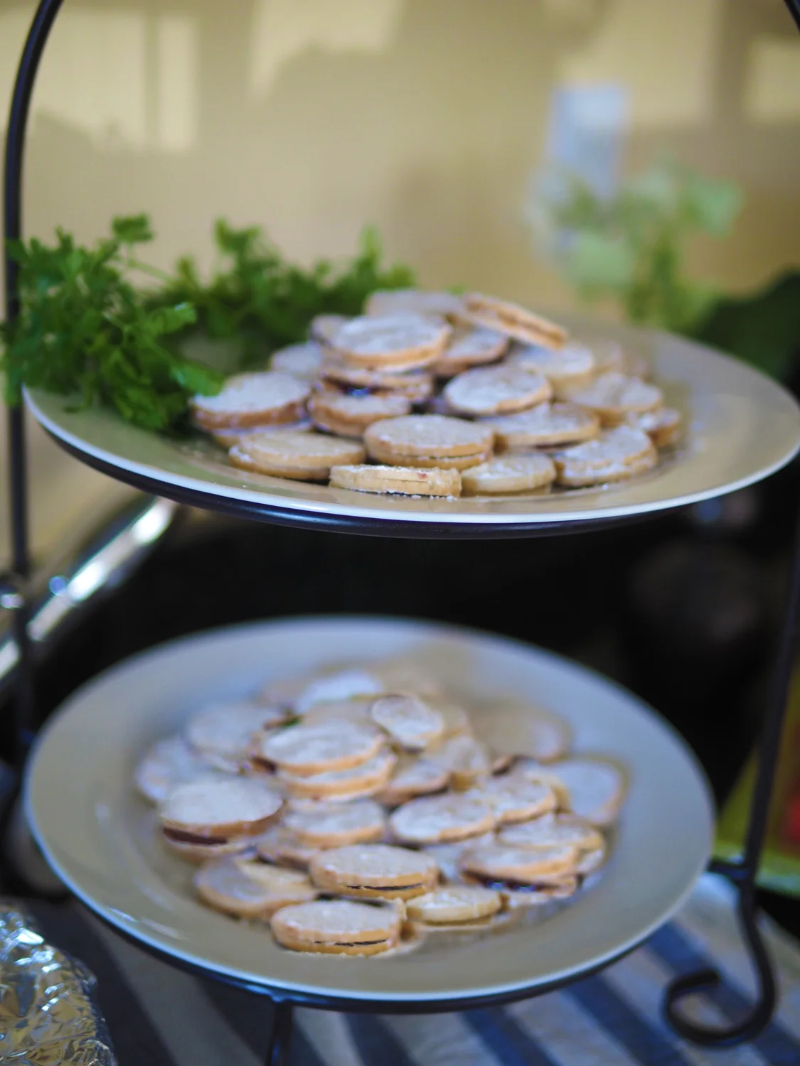 Lime Zest Cookies with Raspberry filling. Tart and sweet and delicate.